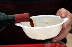 pouring wine in soup