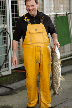fisherman with brochet