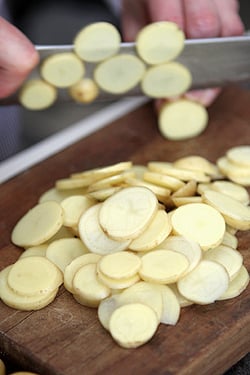 slicing potatoes