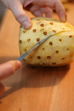 removing pineapple eyes