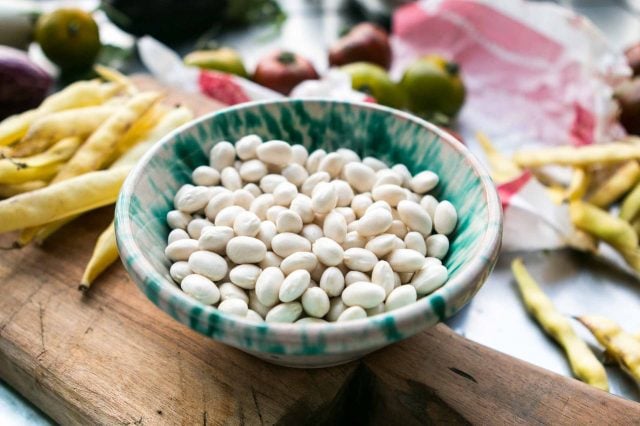 Shelling beans for Tomato salad with basil vinaigrette